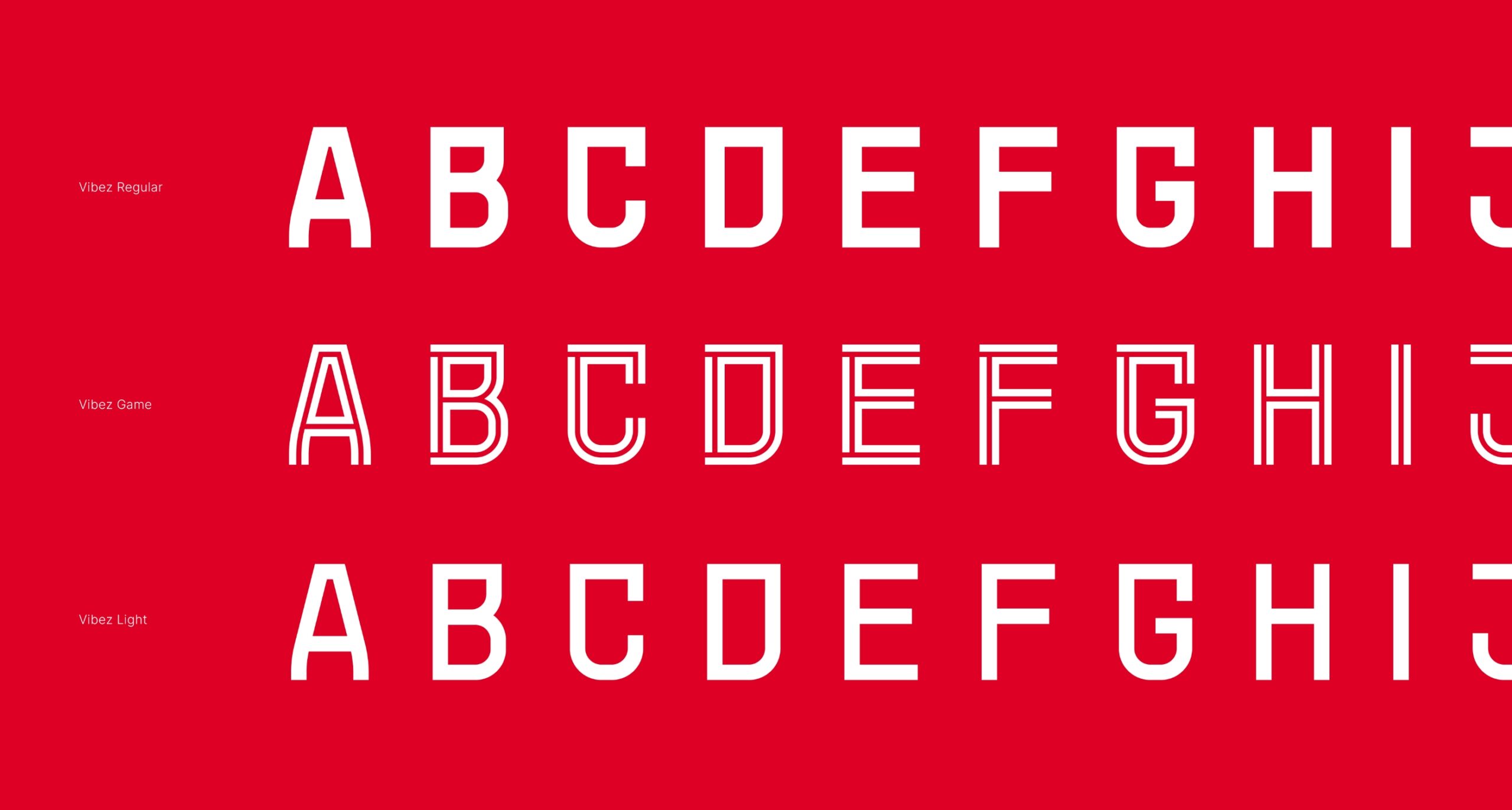 Alfabeto maiuscolo bianco su sfondo rosso, con il font ufficiale del club.